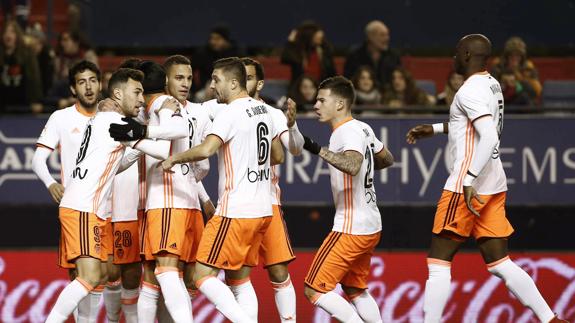 Los jugadores del Valencia celebran el gol de Munir. 