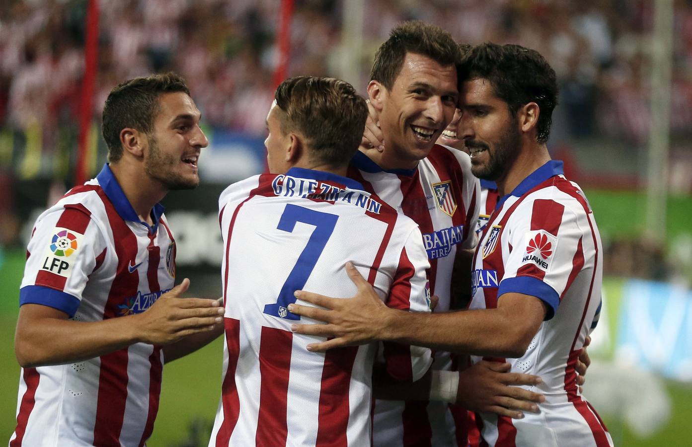 Los jugadores del Atlético celebran el gol.