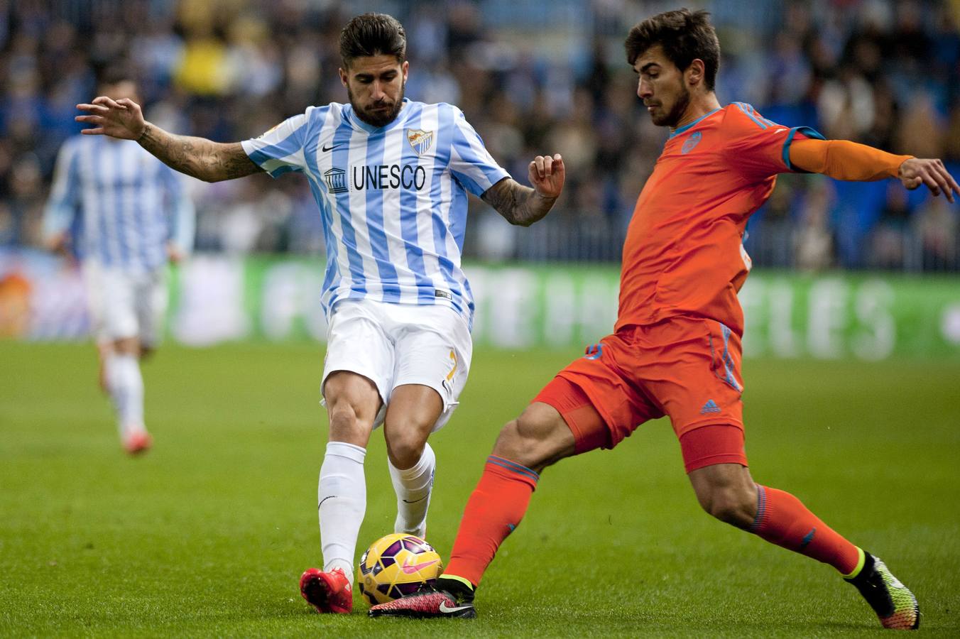 El Málaga - Valencia en imágenes