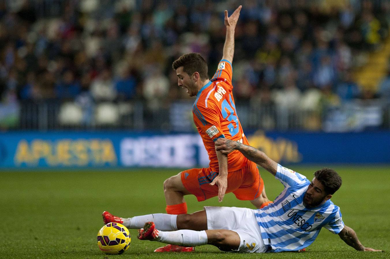 El Málaga - Valencia en imágenes