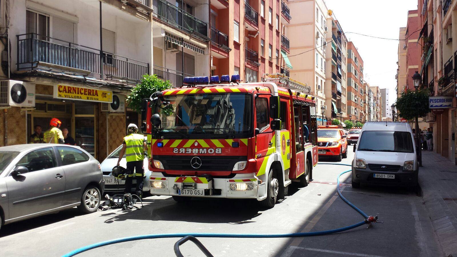 Fotos del incendio en un edificio de Mislata