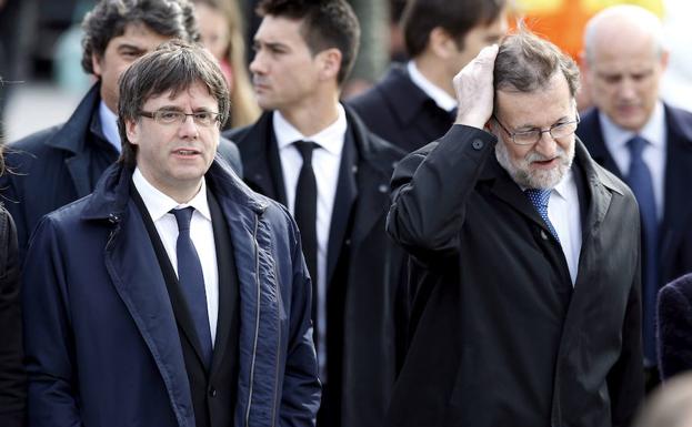 Puigdemont y Rajoy en Barcelona.