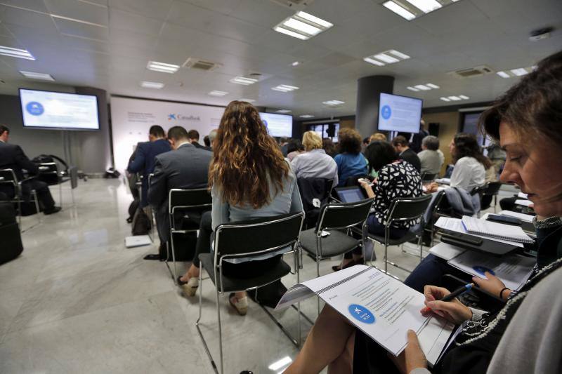 Fotos de la presentación de resultados de Caixabank en Valencia