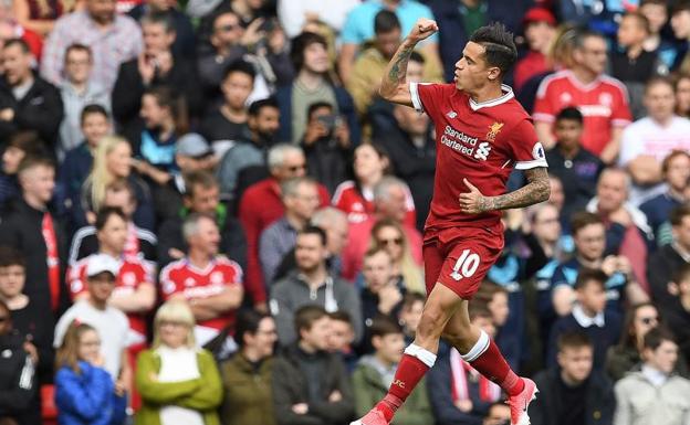 Philippe Coutinho celebra un gol con el Liverpool. 