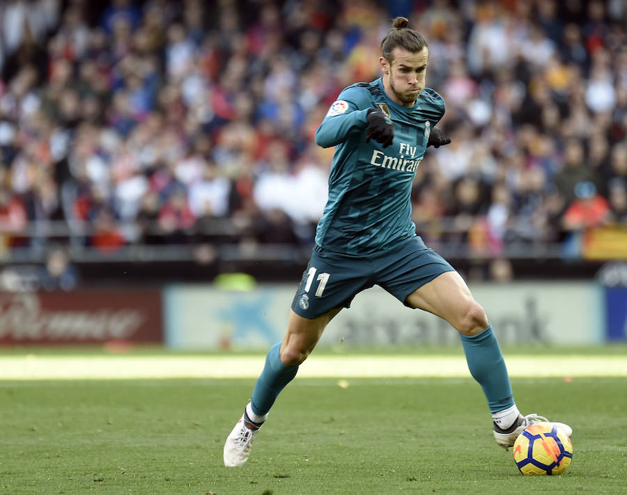 El Real Madrid venció a domicilio por 1-4 al Valencia en Mestalla en la jornada 21 del campeonato liguero. Cristiano anotó un doblete de penalti y Mina recortó distancias pero los goles de Marcelo y Kroos terminaron por dar la victoria al cuadro blanco.