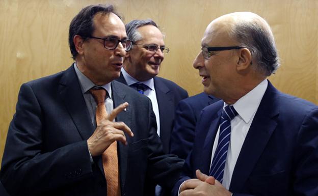 El conseller Vicent Soler, junto al ministro Montoro.