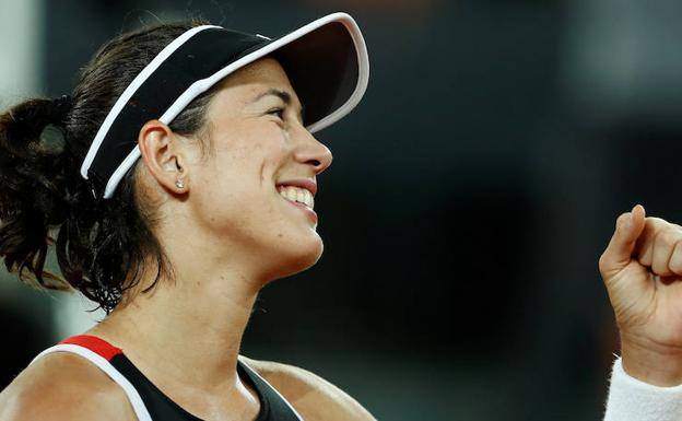 Garbiñe Muguruza celebra su victoria. 