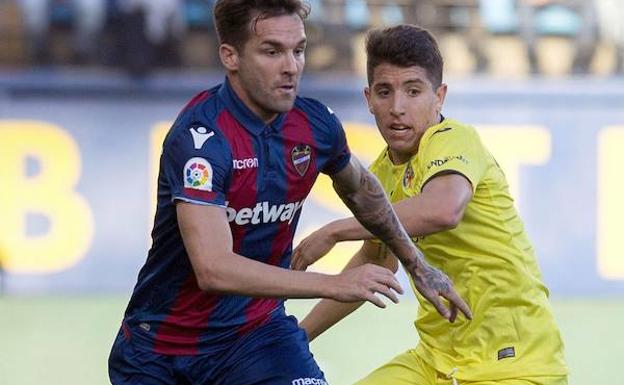 Toño, junto a Cáseres en un partido en Vila-real.