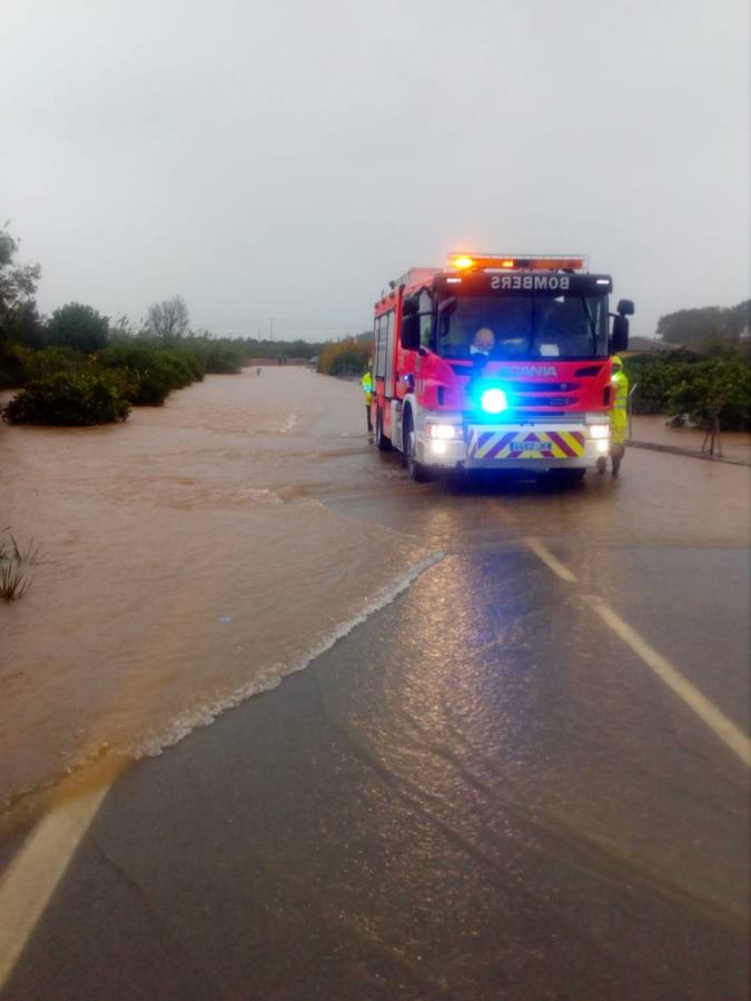 Fotos: Lluvias en Valencia: Desbordamientos, inundaciones y carreteras cortadas en la provincia de Valencia