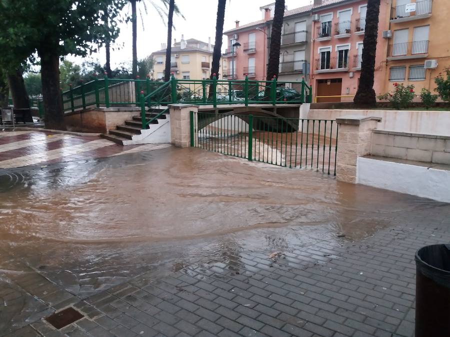 Fotos: Lluvias en Valencia: Desbordamientos, inundaciones y carreteras cortadas en la provincia de Valencia