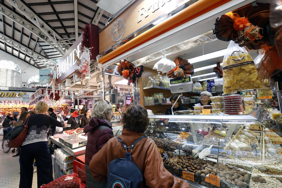 Fotos: La Navidad rescata los mercados de Valencia