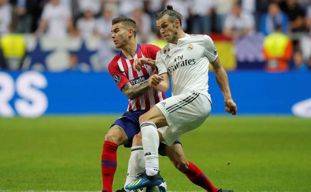 Lucas Hernández (en la imagen junto a Gareth Bale) es objeto de deseo por parte del Bayern. 