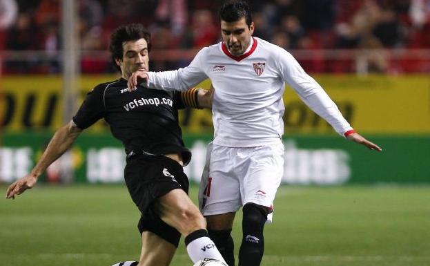 José Antonio Reyes y David Albelda, durante un encuentro entre el Sevilla y el Valencia