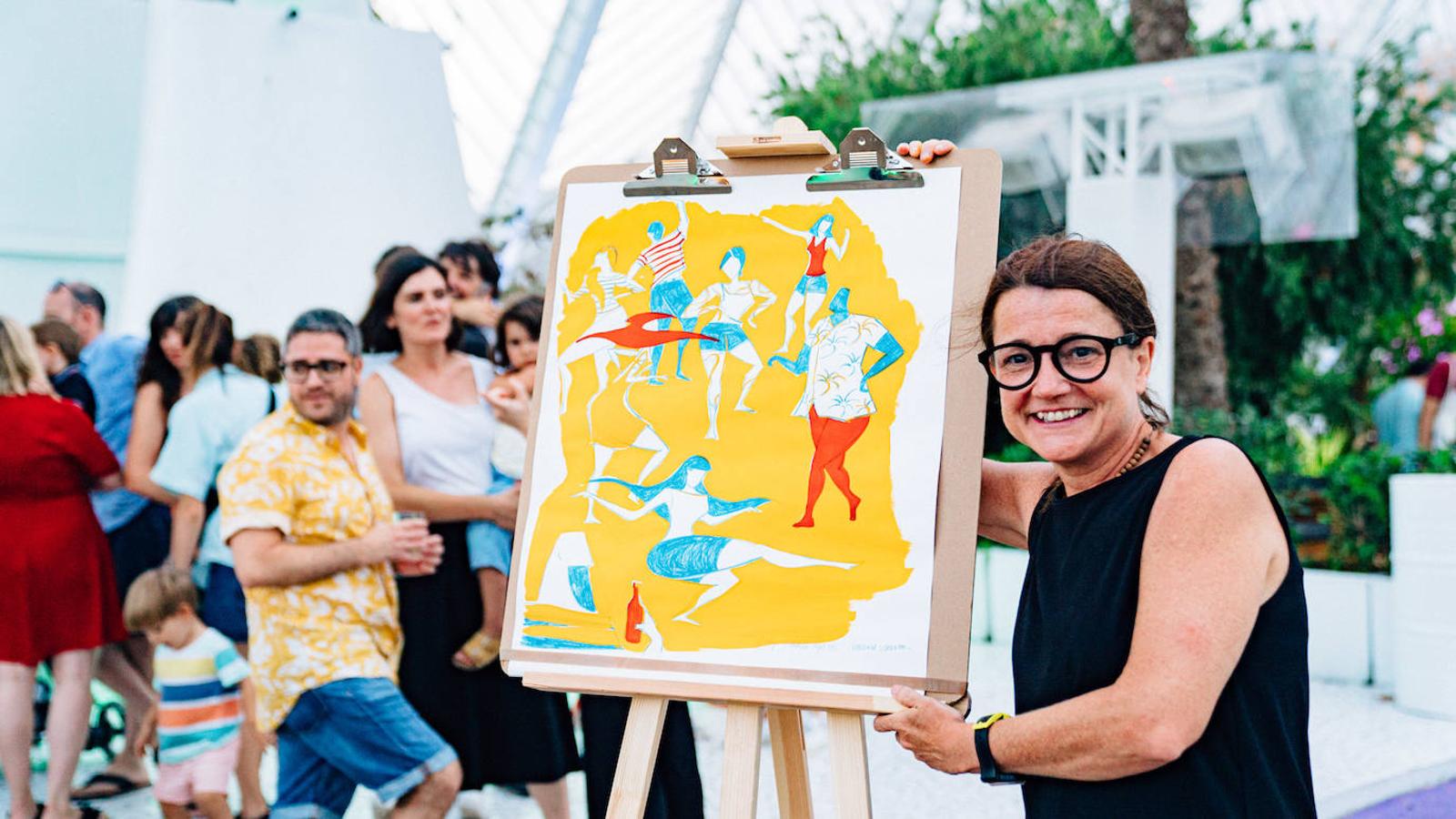 Uno de los espacios más veraniegos de Valencia se suma a los planes al aire libre con una jornada de música en directo, arte y buen ambiente bajo el nombre de Berenar! La propuesta cultural puede presumir de celebrarse en un entorno único como es la Ciudad de las Artes y las Ciencias de fondo. L'Umbracle se ha convertido en el escenario que ha recibido la actuación de Miqui Puig & ACP y las ilustraciones de Virginia Lorente, con un público valenciano que ha acogido el evento con un gran éxito. Si no has podido acercarte, el 28 de julio tienes otra cita con la que cerrar el mes junto al directo de Los Tiki Phantoms y las obras de la artista Laura Castelló. 