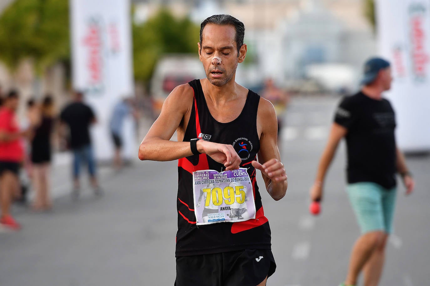 Fotos: Búscate en la 10K XXIV Carrera Tomatina de Buñol 2019