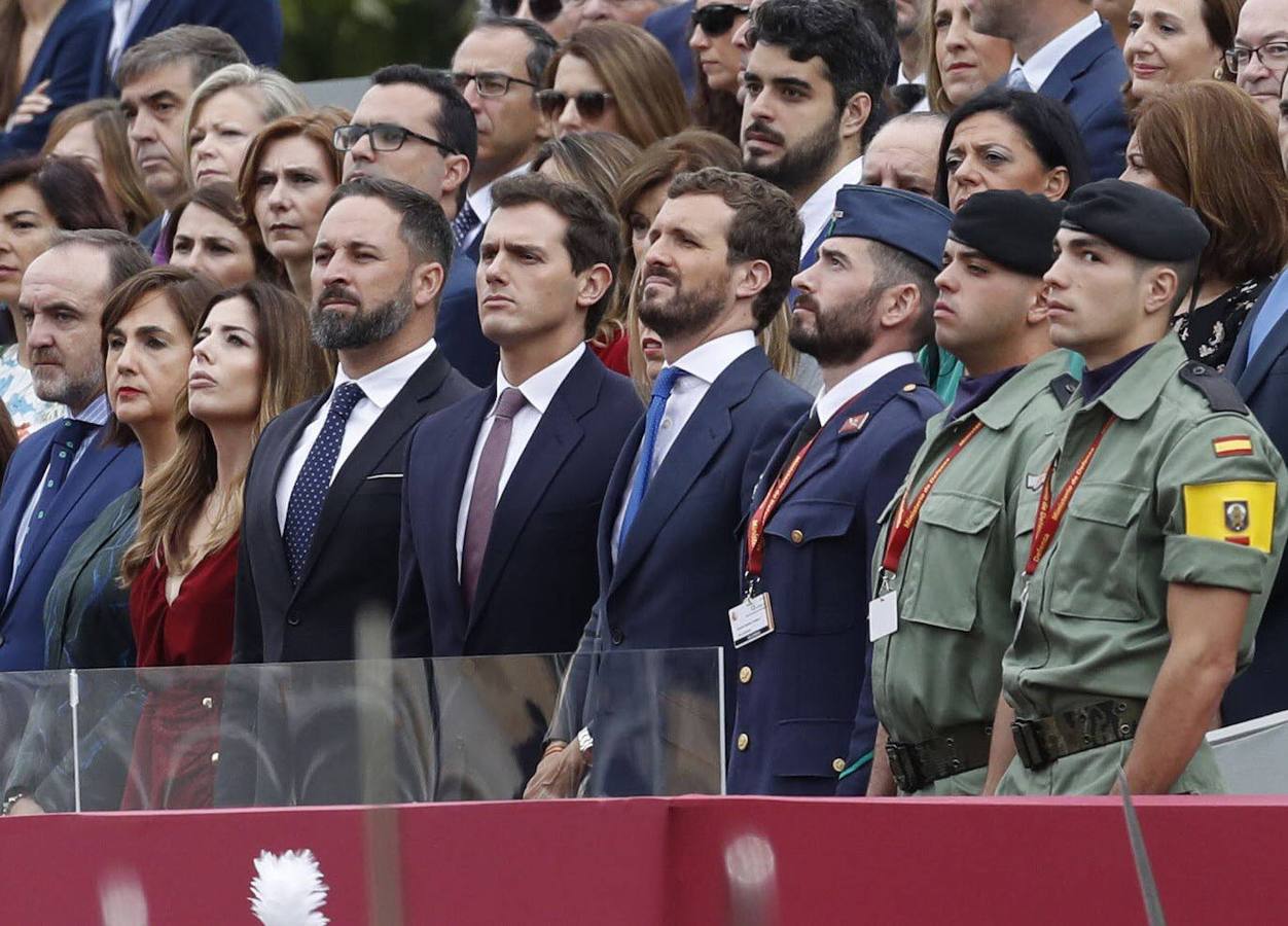 Rivera, junto a Santiago Abascal y Pablo Casado en el desfile de la Fiesta Nacional del pasado octubre.