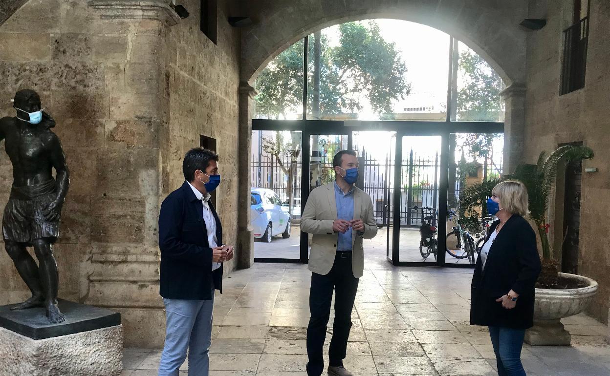 Mazón, Mompó y Vicente, ayer en Valencia.