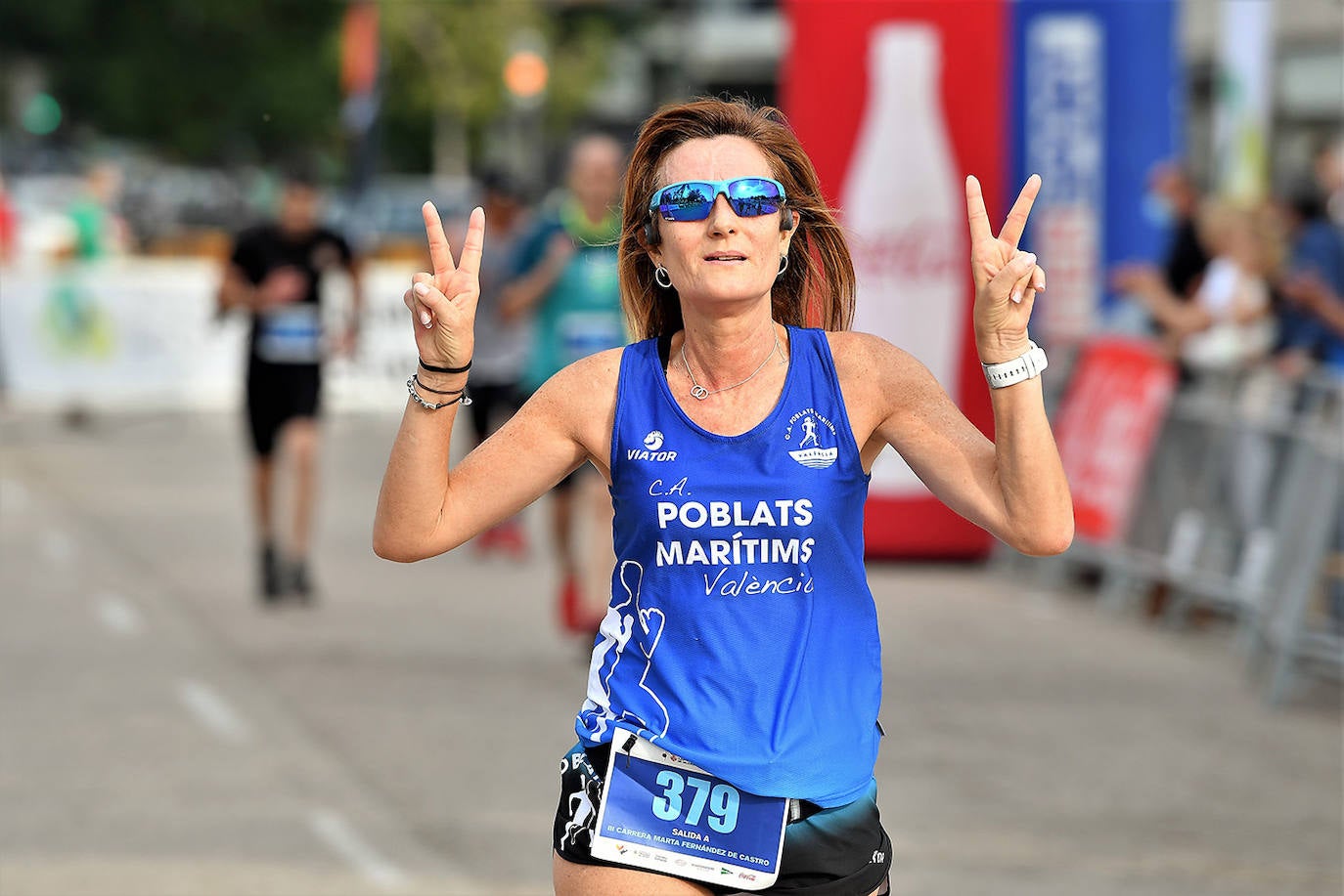 Las calles de Valencia se han llenado de corredores con la tercera edición de la carrera Marta Fernández de Castro, que ha reunido a 1.400 participantes. 