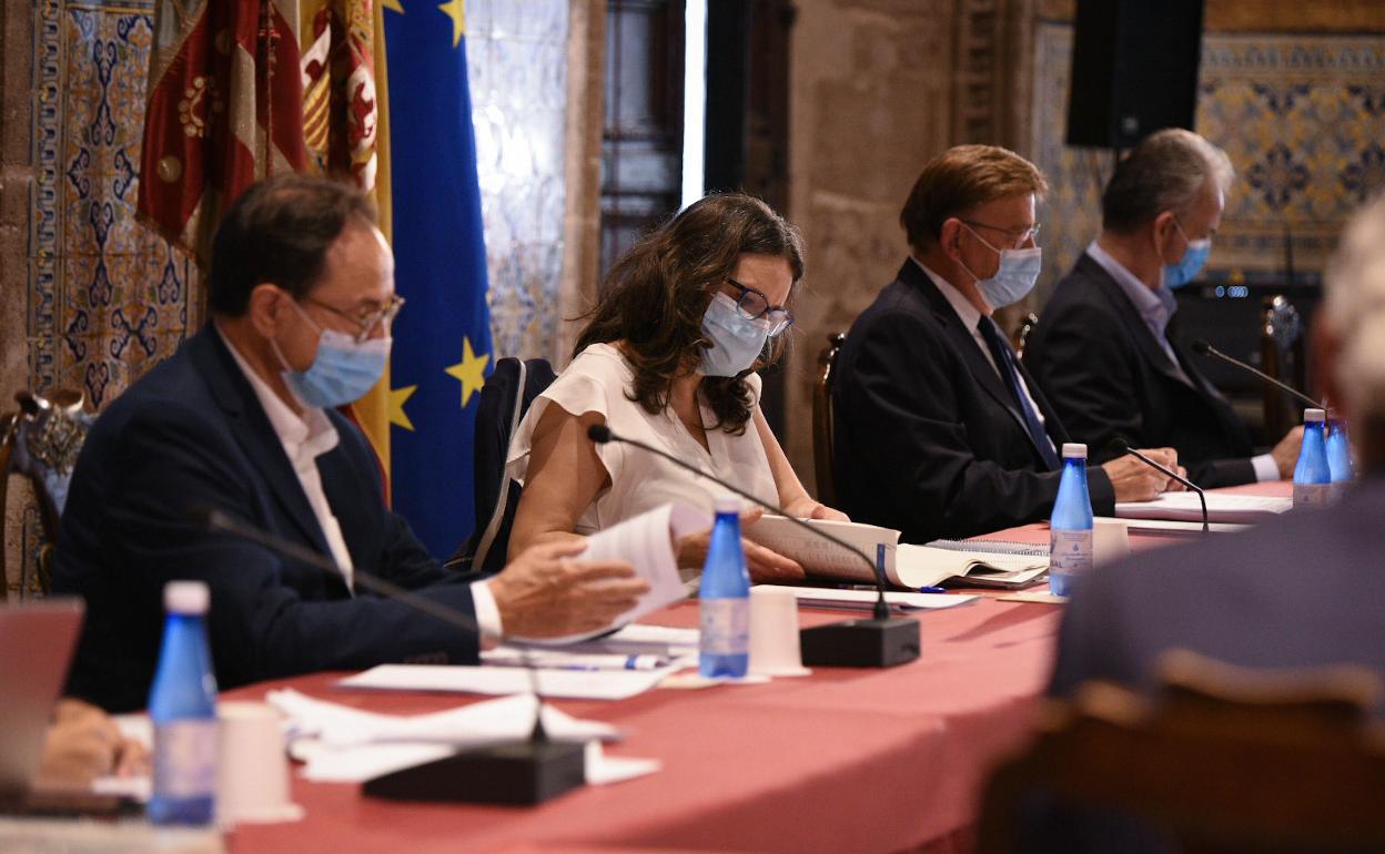 Soler, Oltra, Puig e Illueca, en un pleno del Consell. 