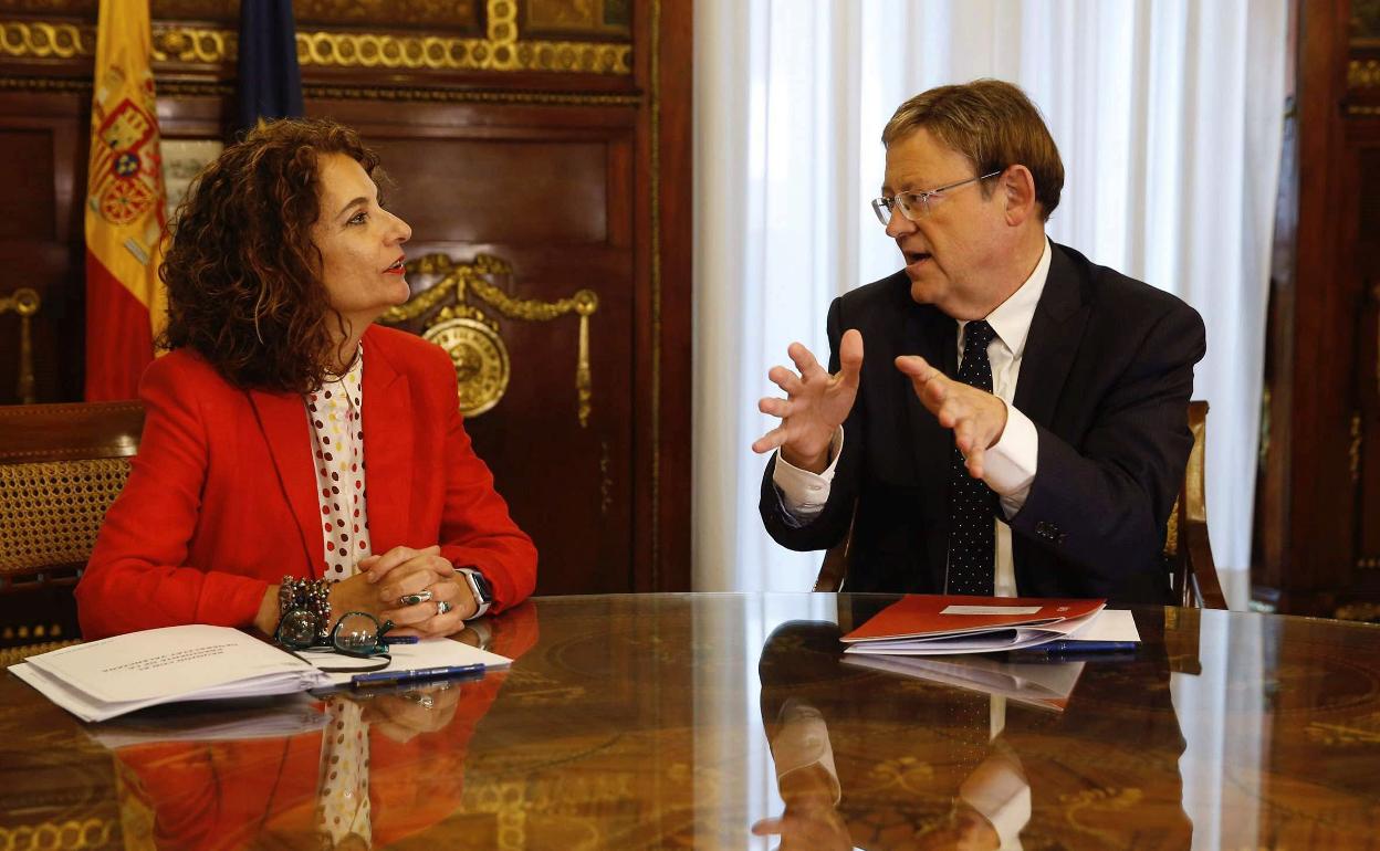 La ministra de Hacienda, María Jesús Montero, y el president Ximo Puig. 