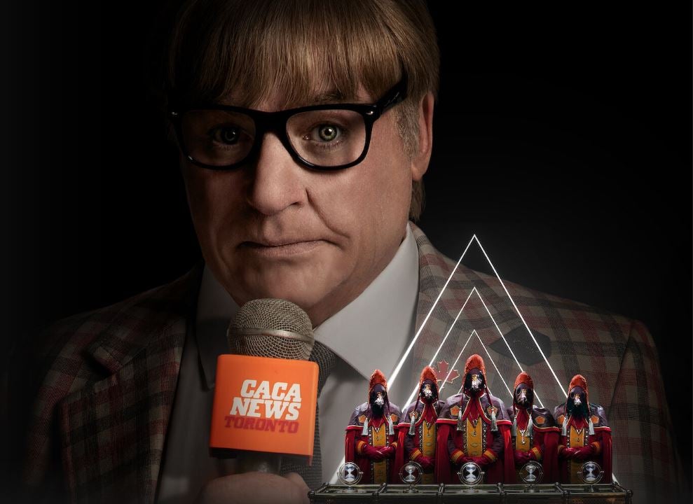 'El Pentavirato' | Plataforma: Netflix. Estreno: el 5 de mayo. Sinopsis: Después de siglos de influir en los acontecimientos históricos, una sociedad secreta se enfrenta a una amenaza interna. ¿Conseguirá salvarla un reportero canadiense? Reparto: Mike Myers, Lydia West y Richard McCabe, entre otros.