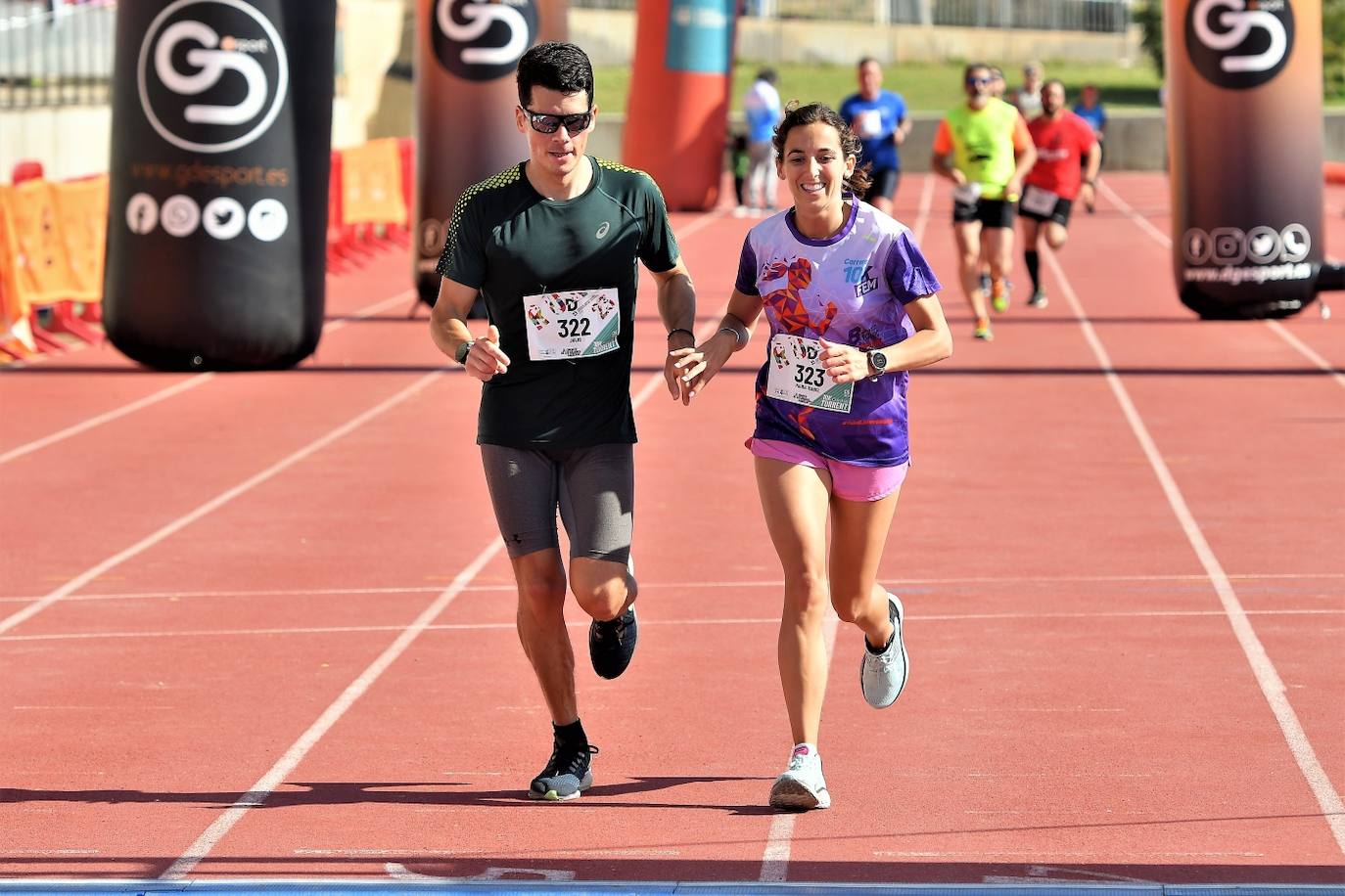 Fotos: Búscate en la 10k y la Media Maratón de Torrent