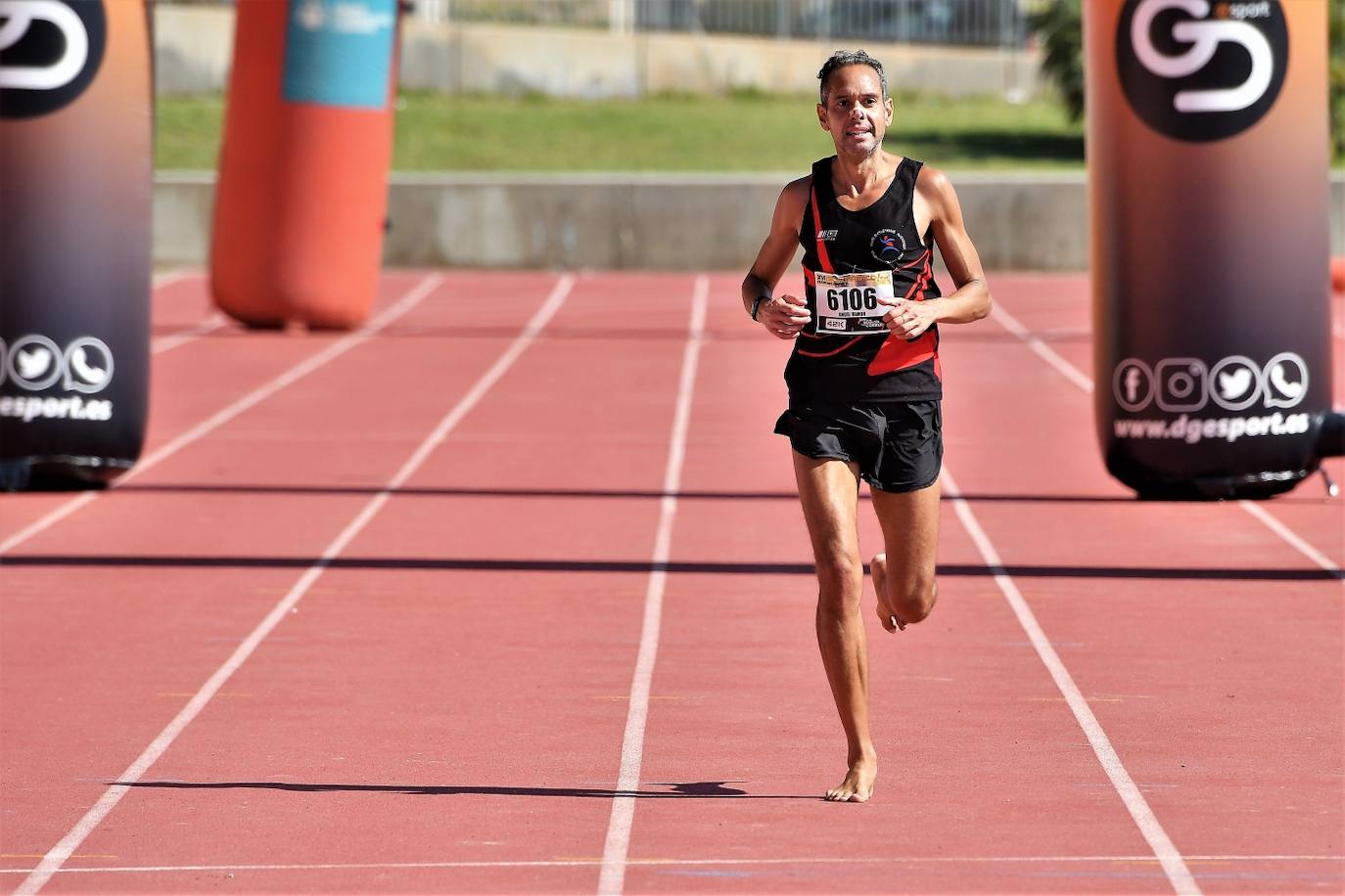 Fotos: Búscate en la 10k y la Media Maratón de Torrent