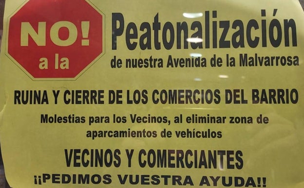 Uno de los carteles que ya se muestran en un comercio. 