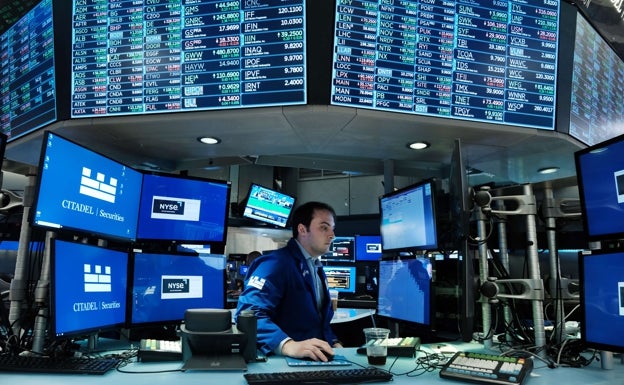 Traders trabajando en la Bolsa de Nueva York. 