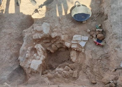 Imagen secundaria 1 - Las excavaciones en el yacimiento. 