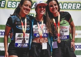 Font y, a su izquierda, Domene, en el podio del Campeonato de España.