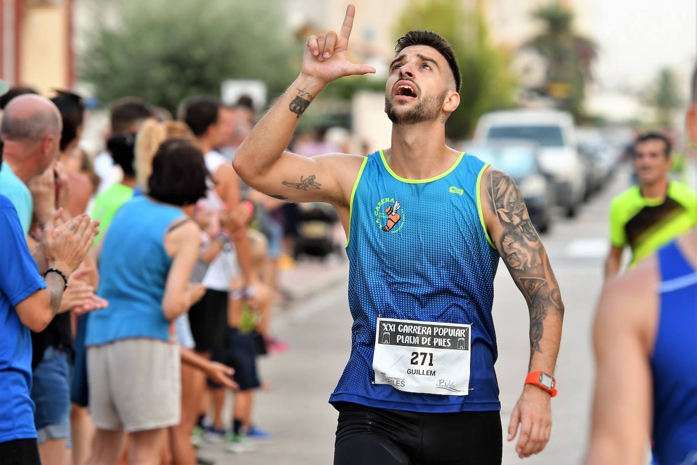 Búscate en la carrera popular Playa de Piles 2023