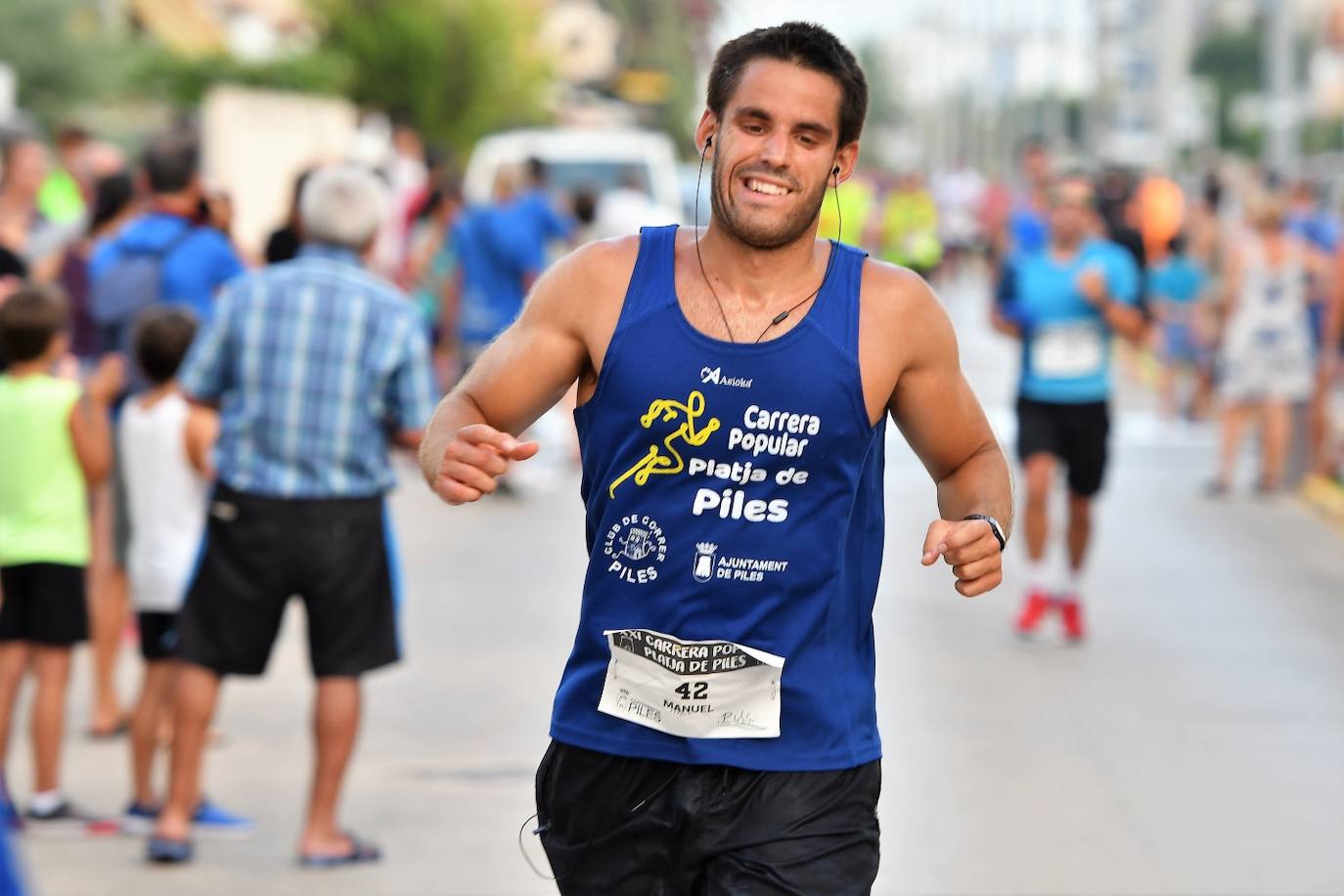 Búscate en la carrera popular Playa de Piles 2023