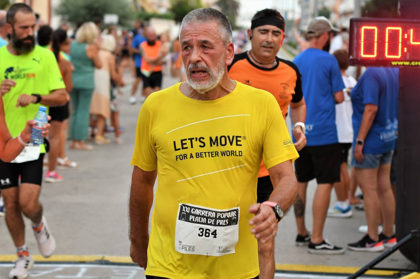 Búscate en la carrera popular Playa de Piles 2023