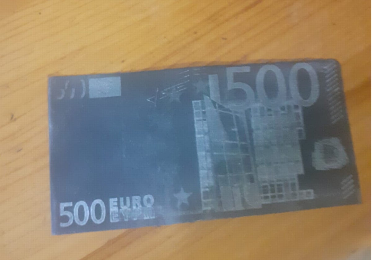 Un billete de 500 euros tintado intervenido al timador.