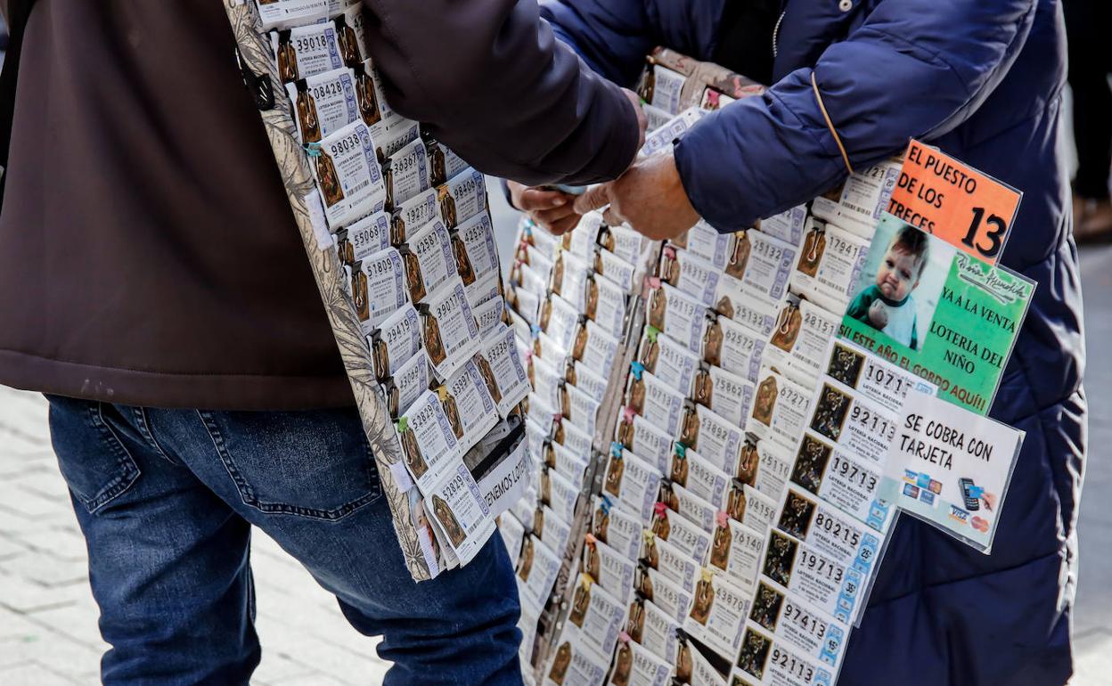 Vendedores de lotería para el Sorteo Extraordinario del Niño