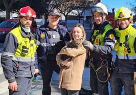 Owner Andrea holds Coco the cat, a survivor of the February 22 Valencia apartment block fire.