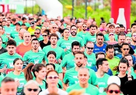 Marea verde en el paseo de la Malvarrosa.