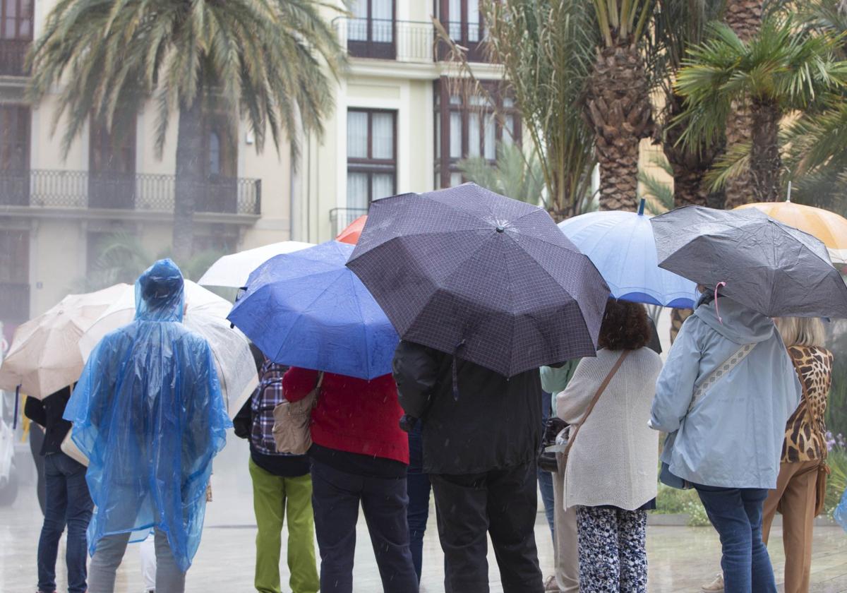 La jornada de lluvias en Valencia, en imágenes