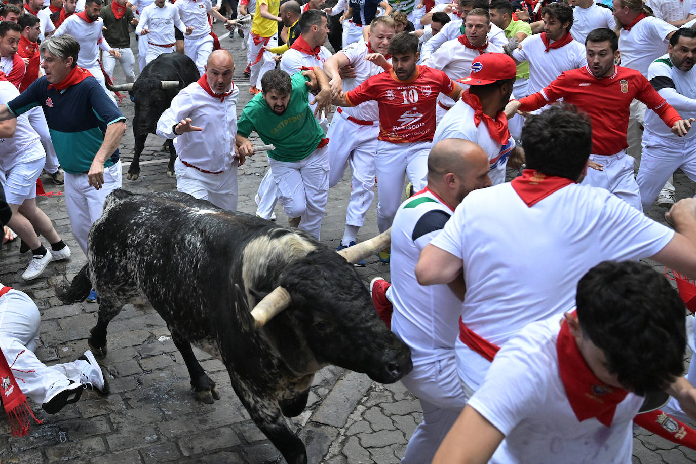 Las mejores imágenes del tercer encierro de San Fermín 2024