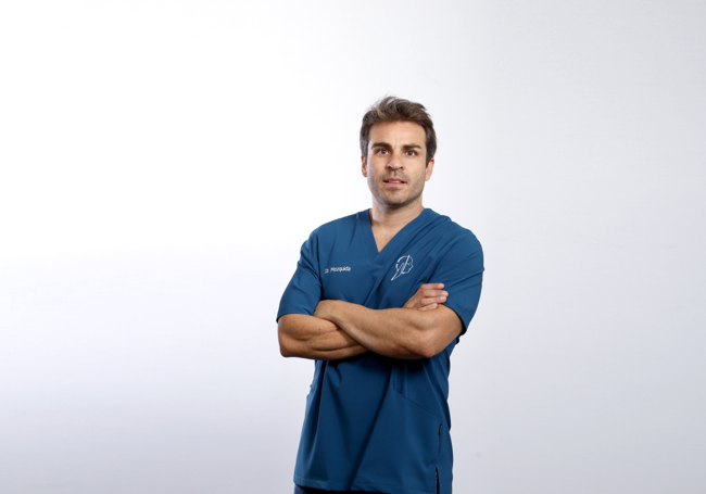 Dr. Carlos Mezquida