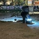 La Policía examina el socavón creado por la detonación de un petardo ilegal.
