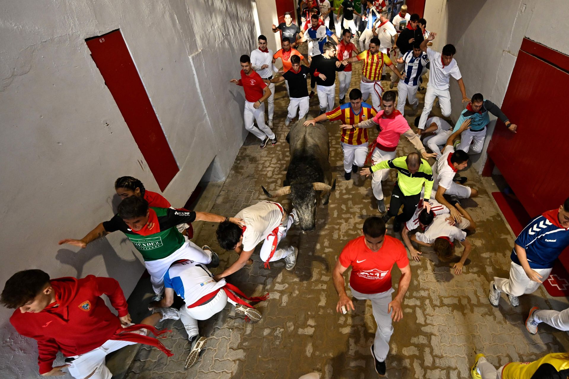 El sexto encierro de San Fermín 2025, en imágenes