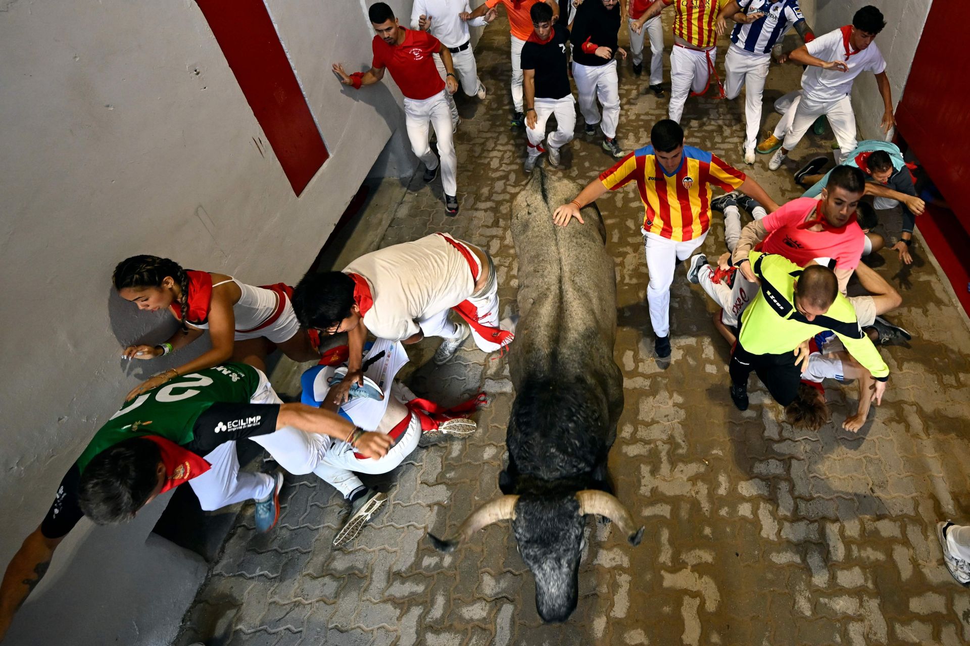 El sexto encierro de San Fermín 2025, en imágenes