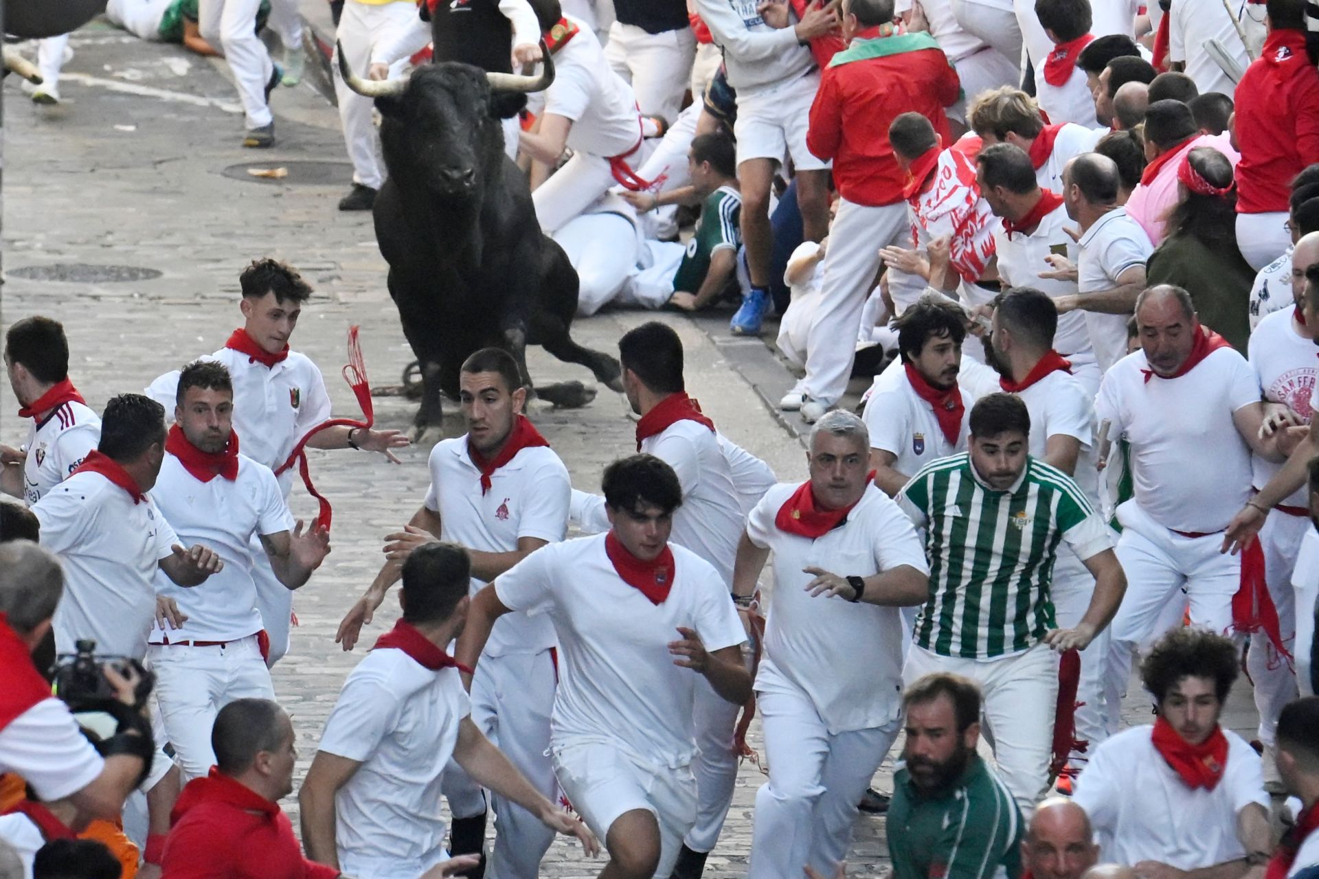 FOTOS | Séptimo encierro de San Fermín 2025