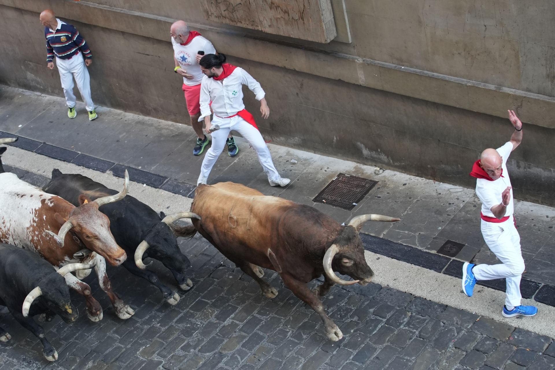 FOTOS | Séptimo encierro de San Fermín 2025