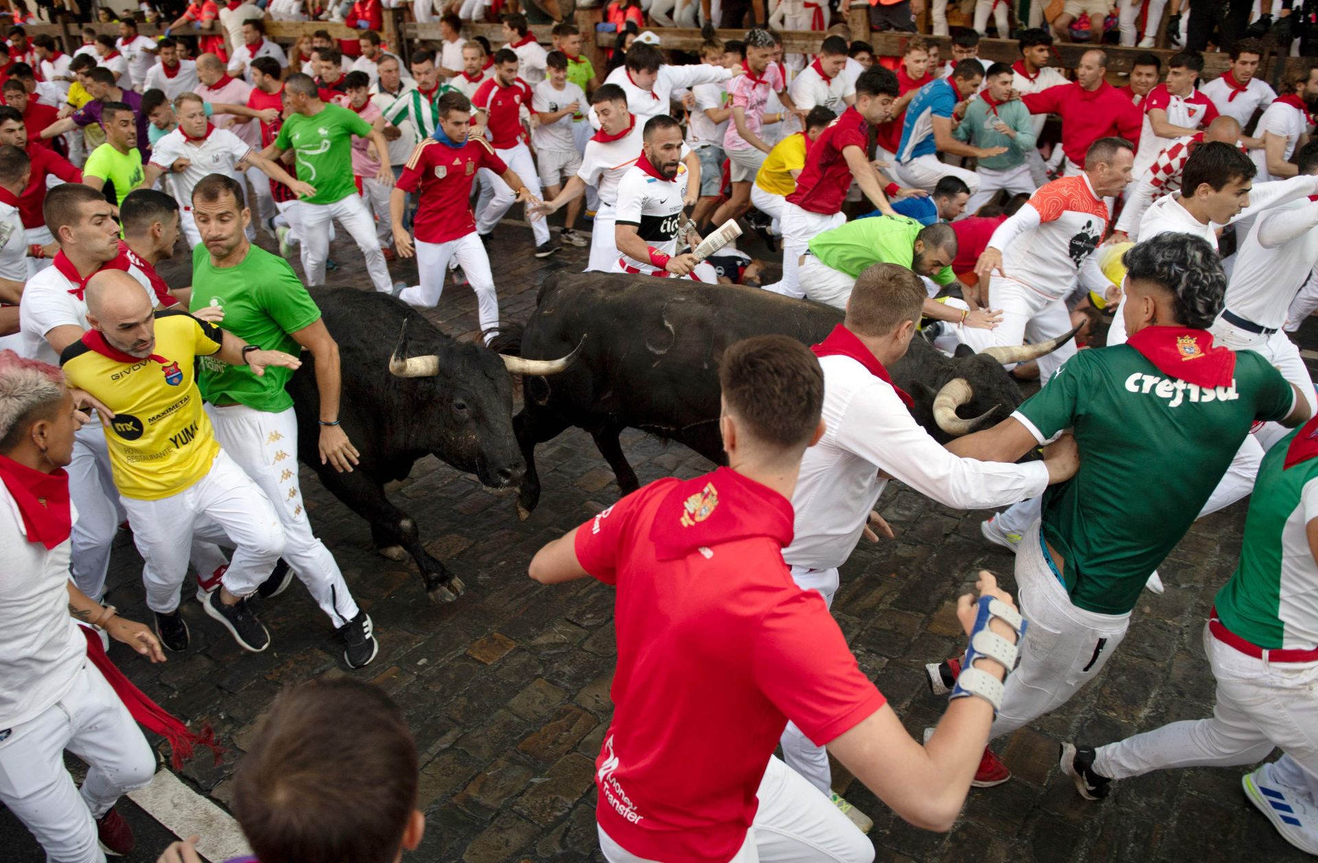 FOTOS | Séptimo encierro de San Fermín 2025