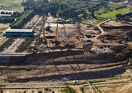 Destrozos de la riada sobre el cauce del barranco del Poyo.