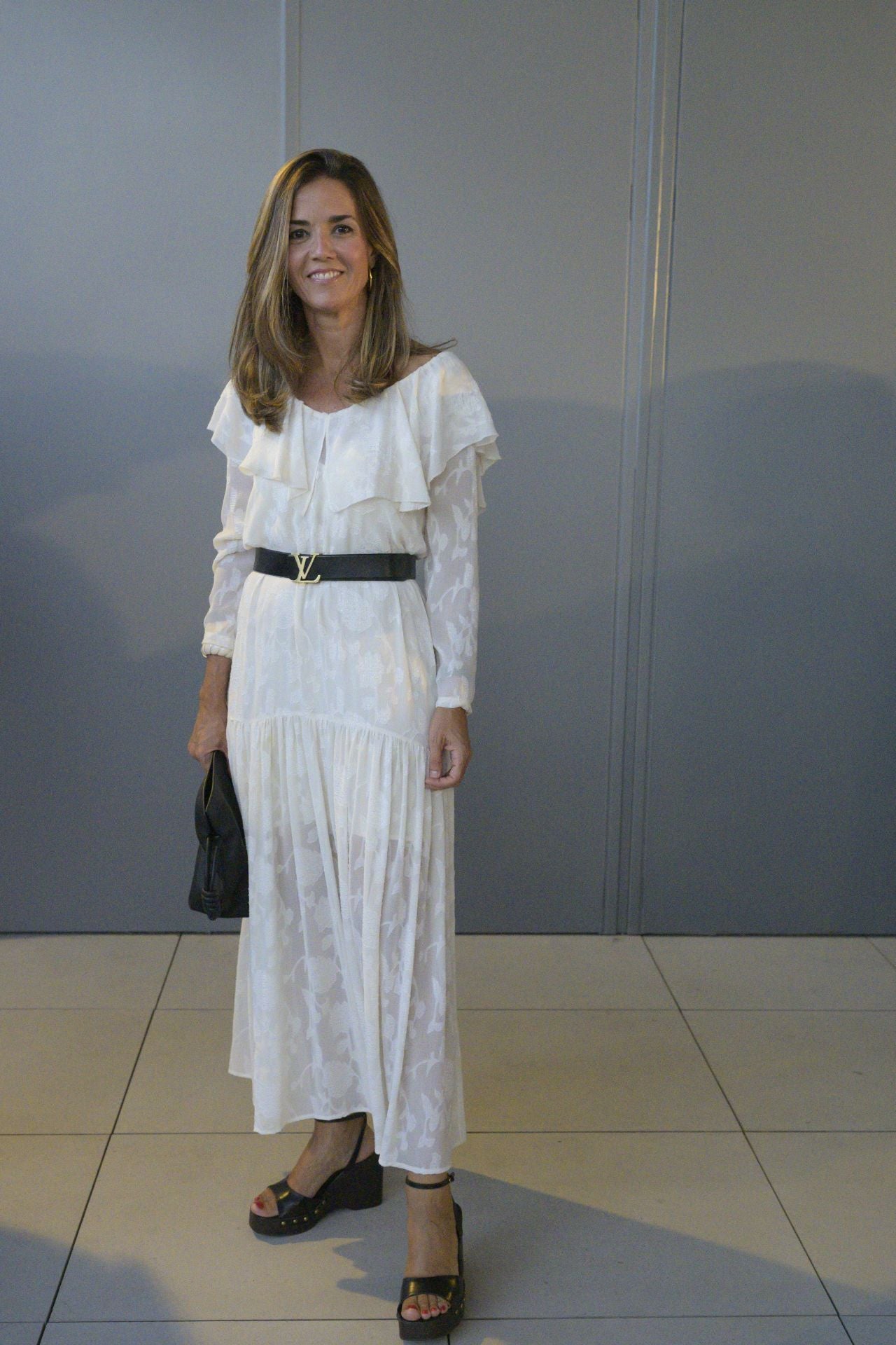 Gema Guzmán combinó un vestido vintage con un cinturón de Louis Vuitton y bolso de Loewe.