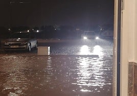 Inundación en una calle del barrio del Cristo de Aldaia.i
